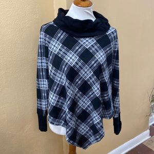 Stay warm in style and comfort. New direction poncho.